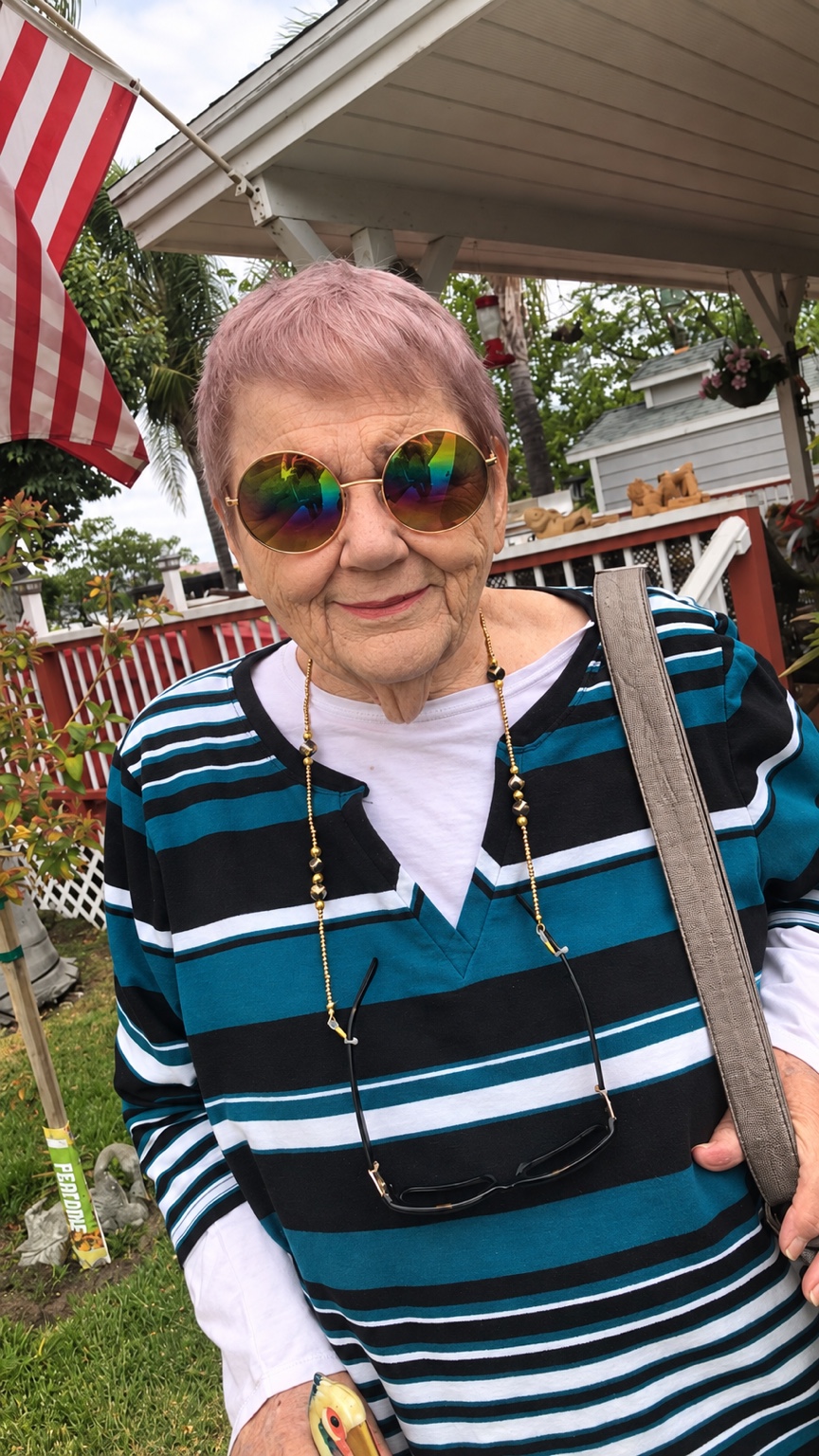 The pink hair with those rainbow glasses? Yeah, she was cooler than everybody.