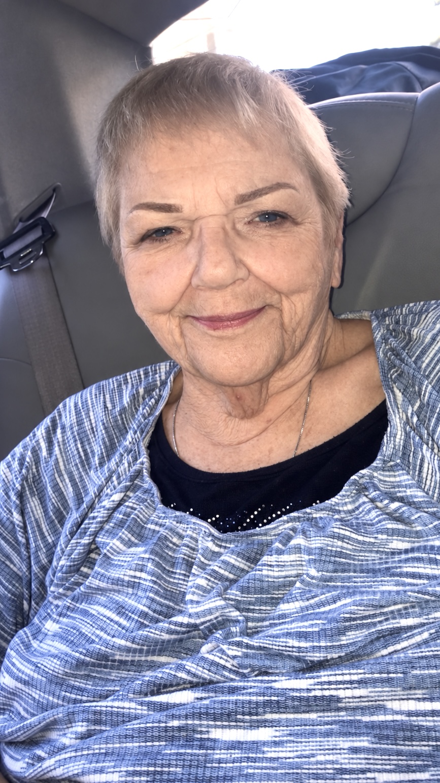 Glammed Gram, looking better than everybody from the back seat.