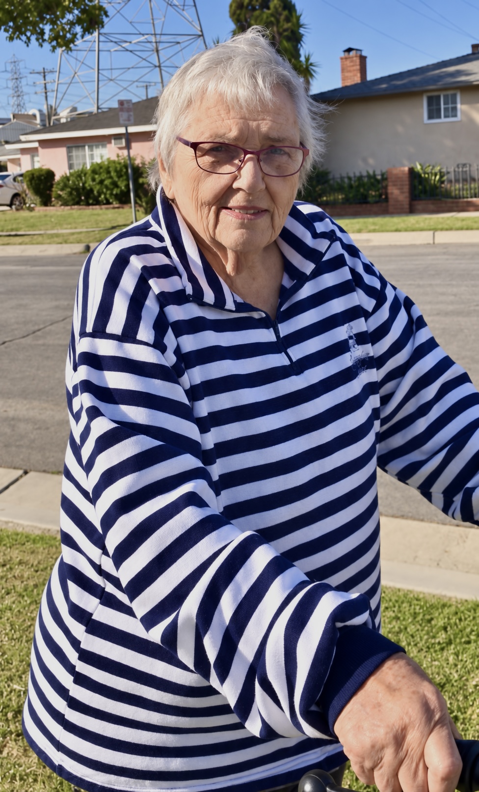 Just across the street, on our way to one of her favorite places: a yard sale.