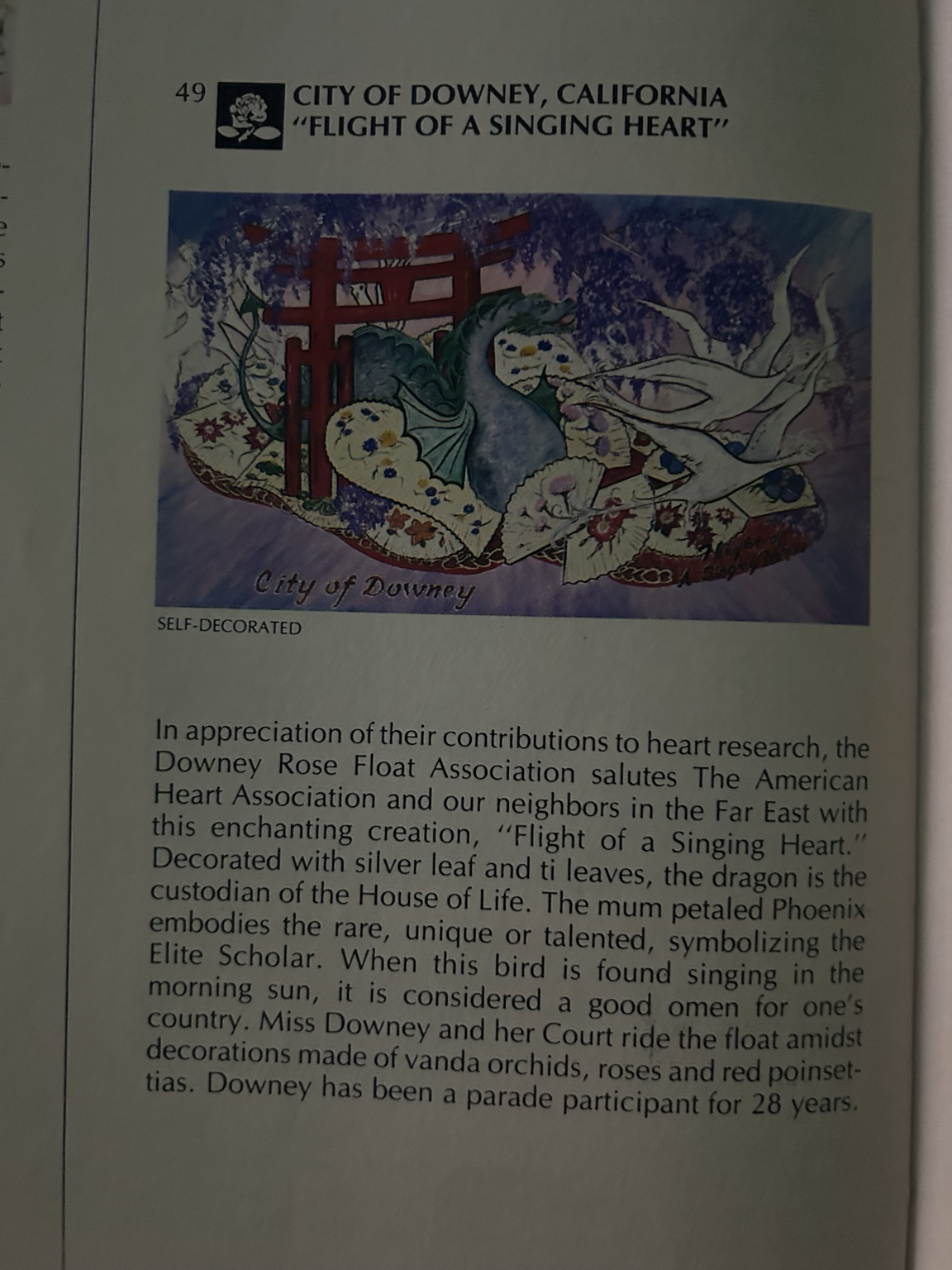 Tournament of Roses program page showing the City of Downey float Flight of a Singing Heart.